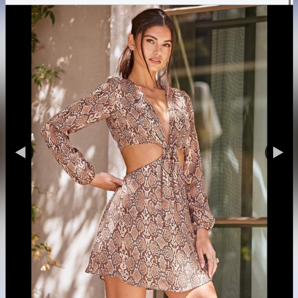Resa xs mini dress with cut outs and open back